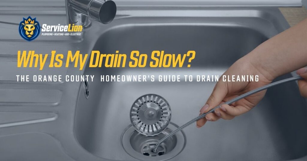 A person uses a drain snake tool to clean a kitchen sink drain; text on image reads "Why Is My Drain So Slow? The Orange & Yorba Linda Homeowners' Guide to Drain Cleaning.