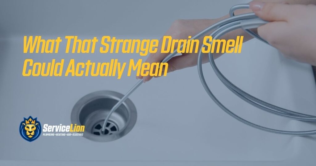 Hands holding a flexible hose over a kitchen sink drain, with text about the possible causes of a strange drain smell—helpful tips for Orange & Yorba Linda homeowners during summer when AC repair and plumbing issues often arise.