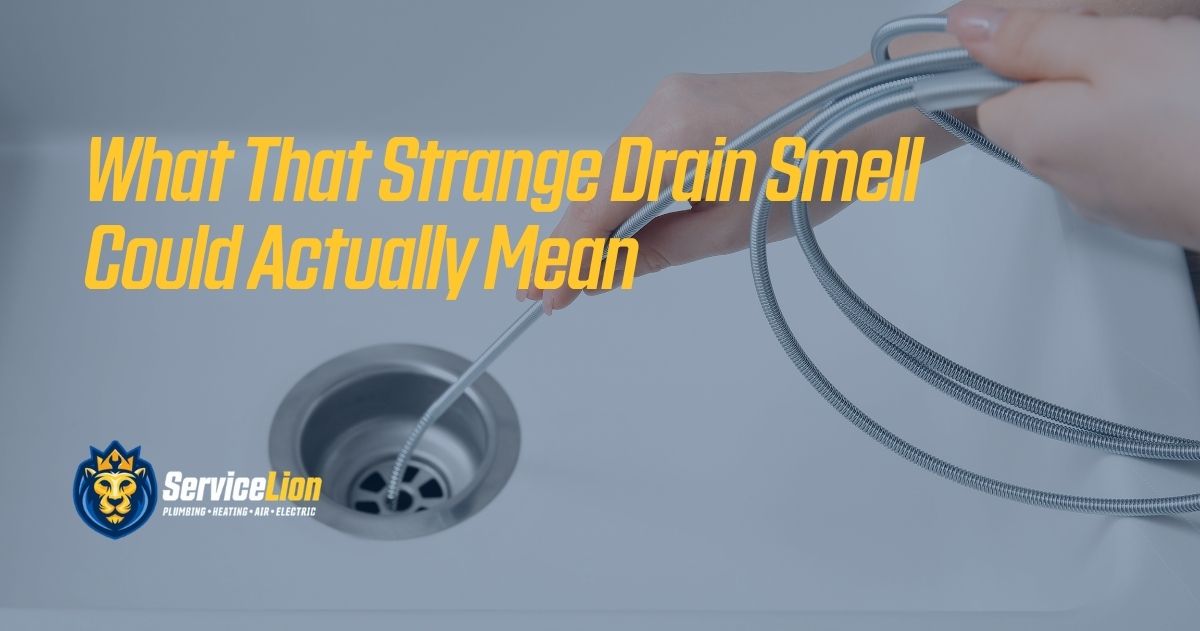 Hands holding a flexible hose over a kitchen sink drain, with text about the possible causes of a strange drain smell—helpful tips for Orange & Yorba Linda homeowners during summer when AC repair and plumbing issues often arise.